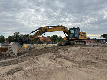 Kāpurķēžu ekskavators CATERPILLAR 323