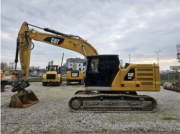 Kāpurķēžu ekskavators CATERPILLAR 323