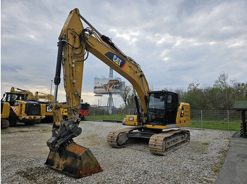 Kāpurķēžu ekskavators CATERPILLAR 323