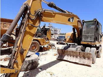 Ekskavators CATERPILLAR M320F