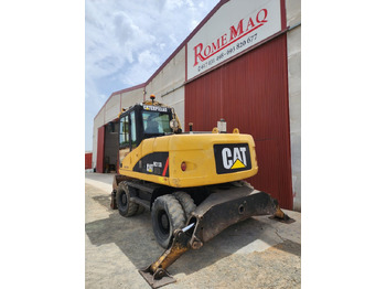 Riteņu ekskavators CAT M313D: foto 2