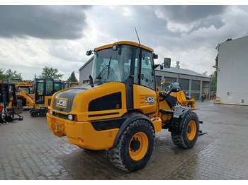 Riteņu iekrāvējs JCB 409: foto 4