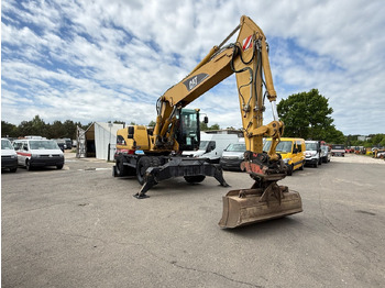 Riteņu ekskavators CATERPILLAR M322C