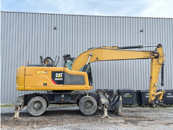 Riteņu ekskavators CATERPILLAR MH3022