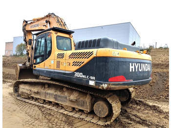 Kāpurķēžu ekskavators HYUNDAI