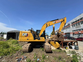 Kāpurķēžu ekskavators CATERPILLAR 323
