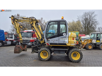Riteņu ekskavators NEW HOLLAND