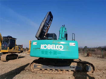 Kāpurķēžu ekskavators Kobelco SK210: foto 2