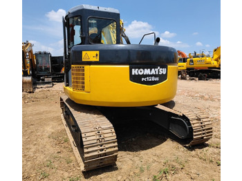 Kāpurķēžu ekskavators Komatsu PC128US: foto 5 Kāpurķēžu ekskavators Komatsu PC128US: foto 5