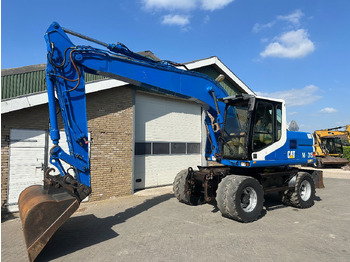 Riteņu ekskavators CATERPILLAR M315