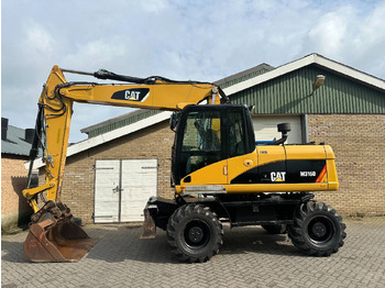 Riteņu ekskavators CATERPILLAR M316D