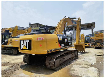 Kāpurķēžu ekskavators CATERPILLAR
