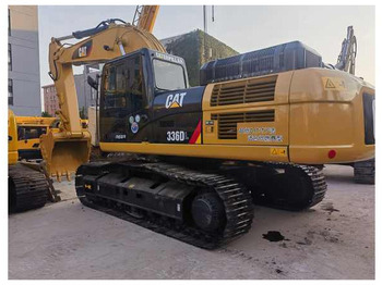 Ekskavators CATERPILLAR