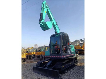 Kāpurķēžu ekskavators KOBELCO