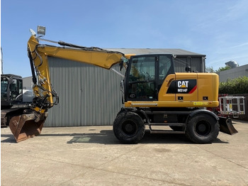 Riteņu ekskavators CATERPILLAR M314F