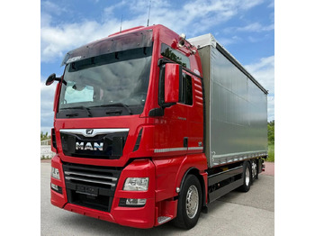 Kravas automašīna ar tentu MAN TGX 26.500