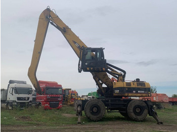 Atkritumu iekrāvējs CAT M 325 C L MH: foto 2 Atkritumu iekrāvējs CAT M 325 C L MH: foto 2