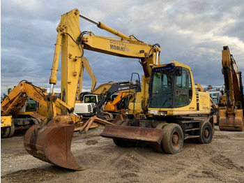 Riteņu ekskavators KOMATSU