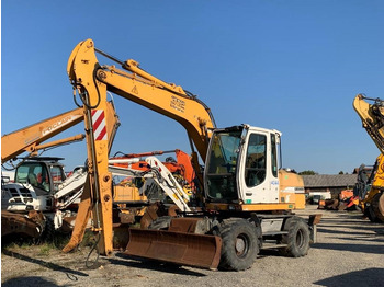 Riteņu ekskavators LIEBHERR