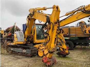 Kāpurķēžu ekskavators NEW HOLLAND