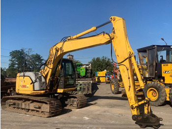 Kāpurķēžu ekskavators NEW HOLLAND