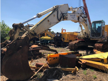 Kāpurķēžu ekskavators NEW HOLLAND E215B