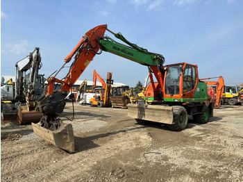 Riteņu ekskavators NEW HOLLAND