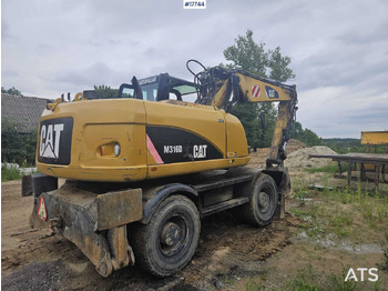Riteņu ekskavators 2008 CAT M316D: foto 4