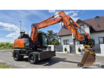 Riteņu ekskavators HITACHI ZX140W-6