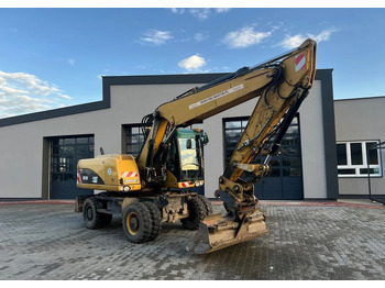 Riteņu ekskavators CATERPILLAR M318D