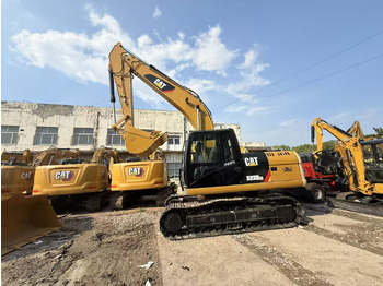 Ekskavators CATERPILLAR 323