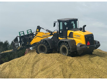 Riteņu iekrāvējs NEW HOLLAND