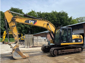 Kāpurķēžu ekskavators CATERPILLAR 323DL