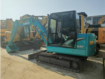 Kāpurķēžu ekskavators KOBELCO