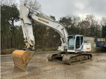 Kāpurķēžu ekskavators NEW HOLLAND