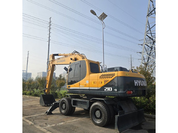 Riteņu ekskavators HYUNDAI R210