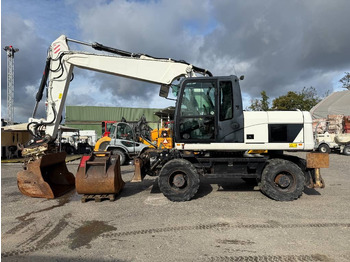 Riteņu ekskavators CATERPILLAR M316D