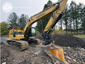 Kāpurķēžu ekskavators CATERPILLAR 323