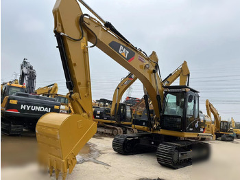 Kāpurķēžu ekskavators CATERPILLAR 320D2