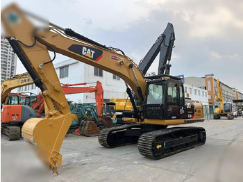 Kāpurķēžu ekskavators CATERPILLAR 323DL