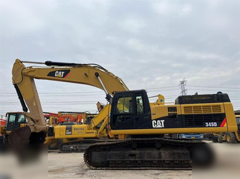 Kāpurķēžu ekskavators CATERPILLAR 345D