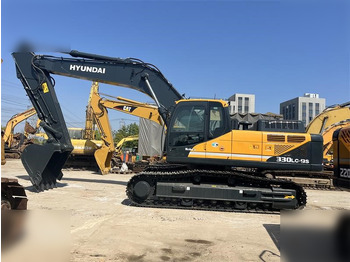 Kāpurķēžu ekskavators HYUNDAI