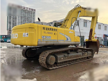 Kāpurķēžu ekskavators KOBELCO