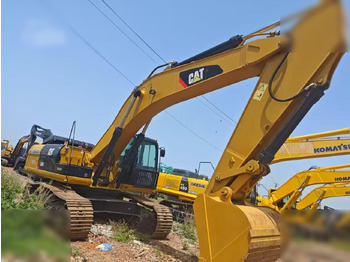 Kāpurķēžu ekskavators CATERPILLAR 336D