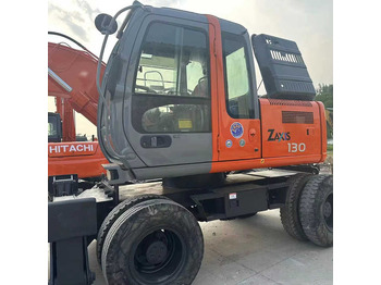 Riteņu ekskavators HITACHI ZX130W