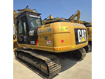 Kāpurķēžu ekskavators CATERPILLAR 323D