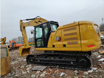 Kāpurķēžu ekskavators CATERPILLAR 323