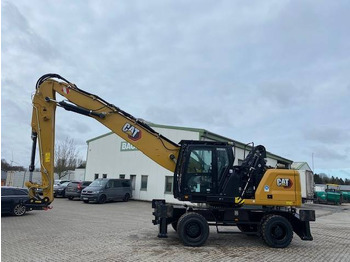 Atkritumu iekrāvējs CATERPILLAR MH3024