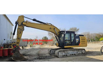 Kāpurķēžu ekskavators CATERPILLAR 323