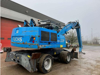 Atkritumu iekrāvējs Fuchs MHL 320: foto 3